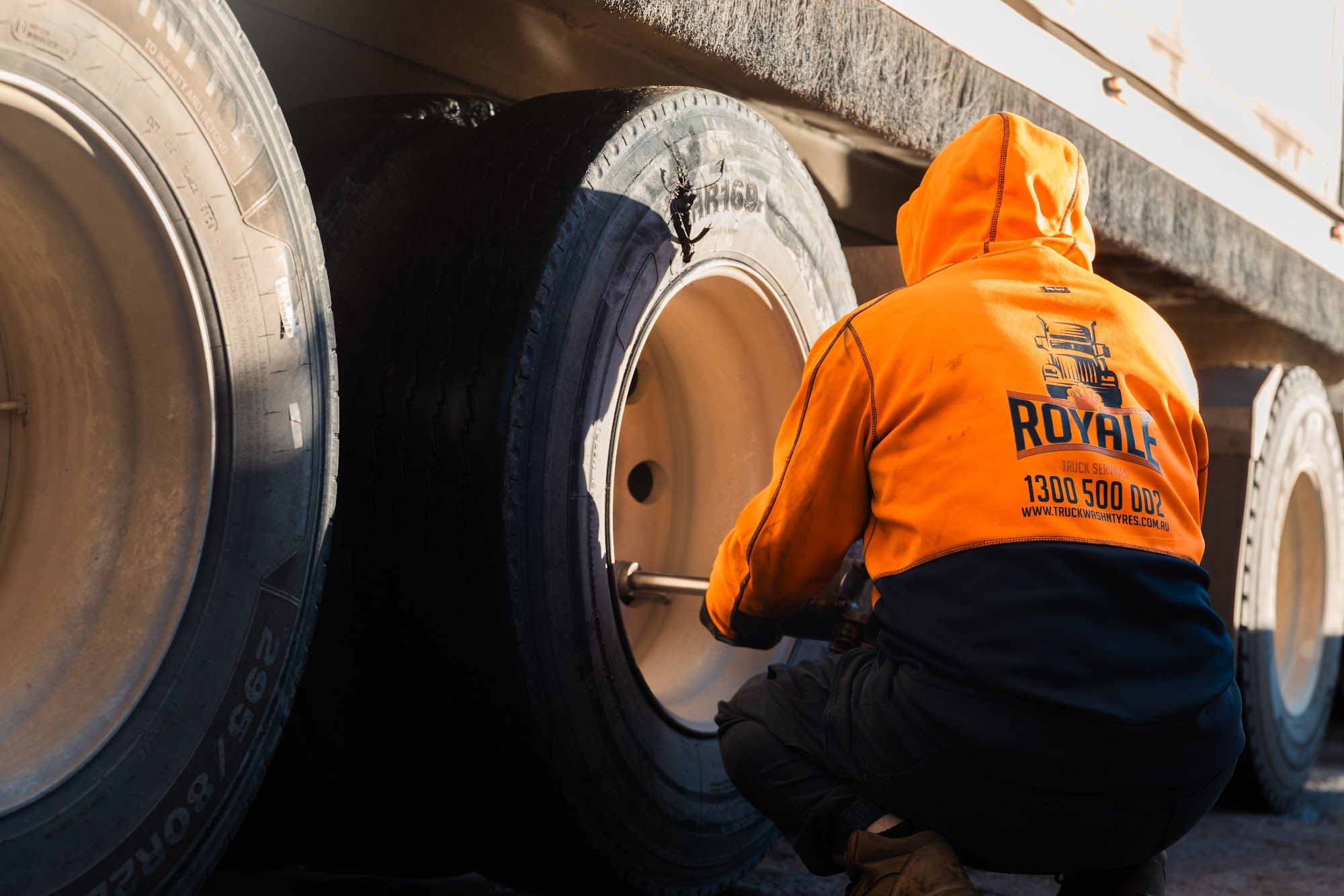 Royale technician fitting a truck tyre