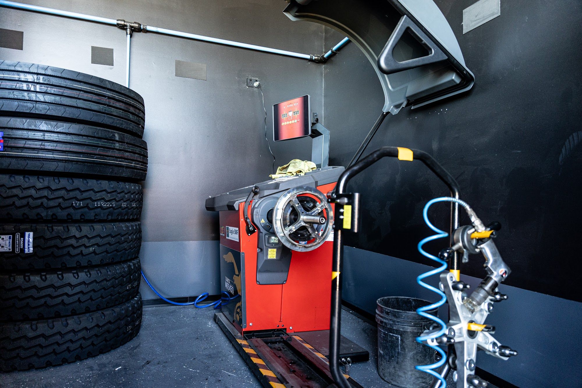 Truck tyre on a wheel balancing machine